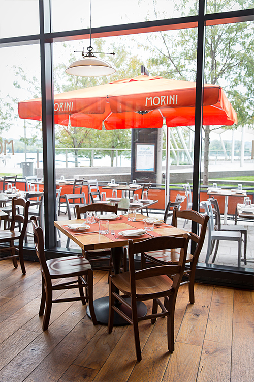 Outdoor seating and interior at the Osteria Morini restaurant in DC