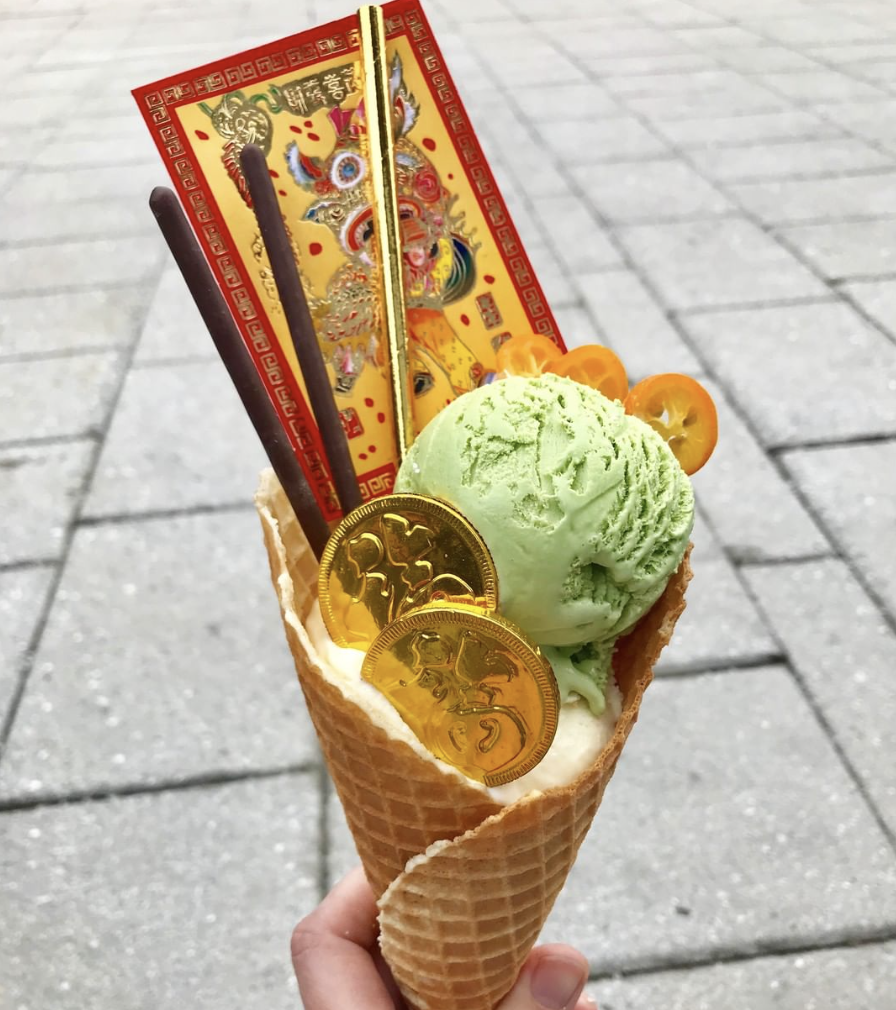 Ice cream cone with Chinese New Year coins and paper money